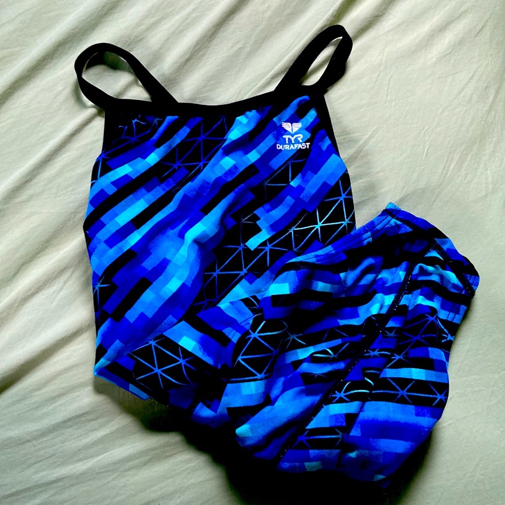 Blue and black womens TYR Durafast swimsuit one piece with cutout back.